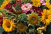 Bouquet of summer flowers, broccoli, berries, cereals