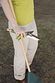 Woman with garden tools