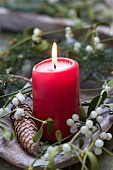 Christmas decoration with burning candle