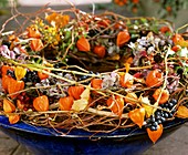 Wreath of grapes, Chinese lanterns, Hydrangea and twigs