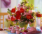 Spring arrangement of ornamental cherry and tulips
