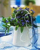 Forget-me-nots in white jug