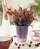 Arrangement of tulips and horned violets