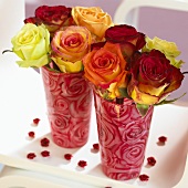 Two vases of roses