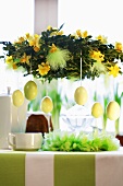 Easter wreath over laid table