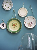 Old porcelain plates hanging on a wall