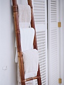 Bath towels hanging on a ladder