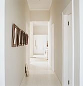 A corridor with pictures on the wall