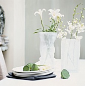 Flowers in vases on dining table