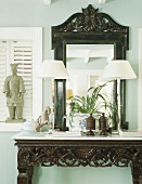 Two table lamps on console table