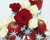 Christmas table decoration with roses and stars