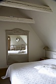 A bedroom under the eaves