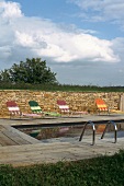 Loungers next to pool