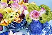 Two mixed arrangements with roses and tulips