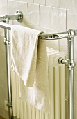 Towel rack with radiator