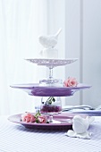 A cake stand made of individual plates and glasses