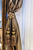 Curtain with decorative cord (close-up)