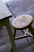 Old wooden table and stool