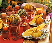Table decorated with pumpkins