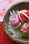 Christmas decorations in a wooden bowl