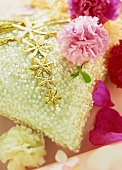 Scatter cushion with sequins and carnations
