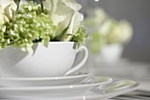 White place-setting with white flowers