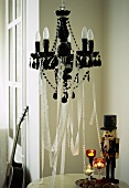 A chandelier decorated with lace