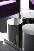 A stainless steel, designer coffee table