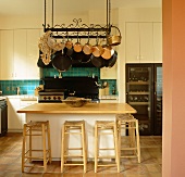 A kitchen counter with bar stools