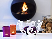Floral shaped plastic bowl and tea lights with a colorful fabric cover