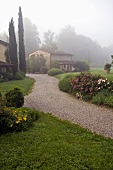 Foggy morning -- Mediterranean countryside and natural stone houses