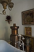 Oriental bathroom with an antique copper stove