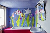 A bathroom with flowers on a blue wall