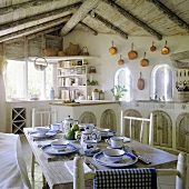 Breakfast in a tropical country house kitchen with a rustic wood beam ceiling