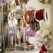 Bracelets and necklaces on a jewellery stand