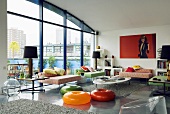 1970s furniture in a rooftop apartment with a vaulted ceiling a view of the city