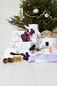 Perfume bottles and presents with Christmas decorations