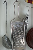 Cookware hanging from hooks