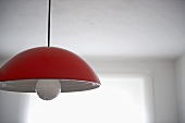 Modern ceiling light with red shade