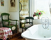 Painted wooden chairs in a bathroom in a country house