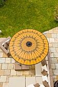 A view of a yellow sunshade on a terrace