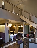 Modern staircase with a view inside a hotel restaurant