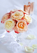 Bouquet of pink roses in a crystal vase