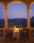 Champagne by candlelight on the veranda of a restaurant