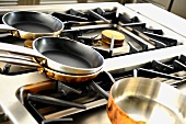 Various pots on a gas cooker