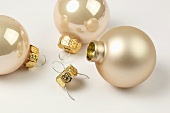 Pink Christmas baubles with hooks