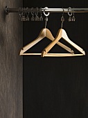 Clothes hangers in a wardrobe