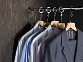 Shirts and suits in a closet