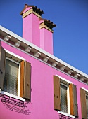 A pink house in Burano