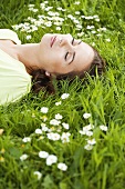 Woman sleeping on grass